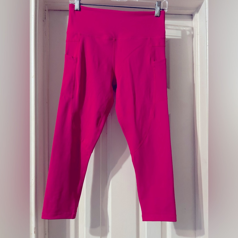 Zyia leggings. Size 6-8. Only worn a few times. Maybe 2-3. Cropped hot pink.